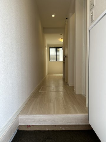 川崎市多摩区栗谷３丁目のアパートの玄関