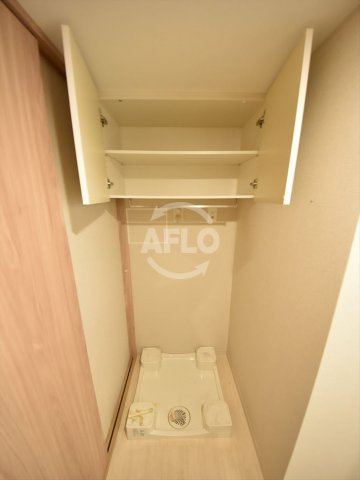 ロジュマンタワー梅田　扇町小学校区の設備|ロジュマンタワー梅田　室内洗濯機置き場
