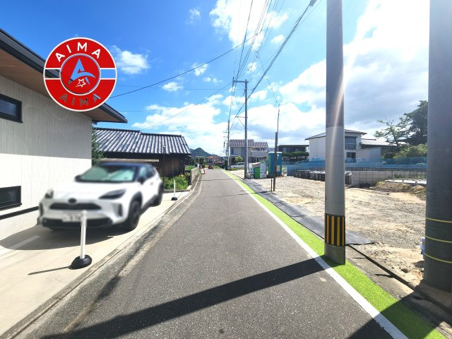 福津市西福間1丁目第6-2棟（1号棟）の外観|前面道路含む現地の写真です。