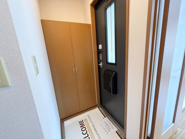 ドルフ東久万の玄関