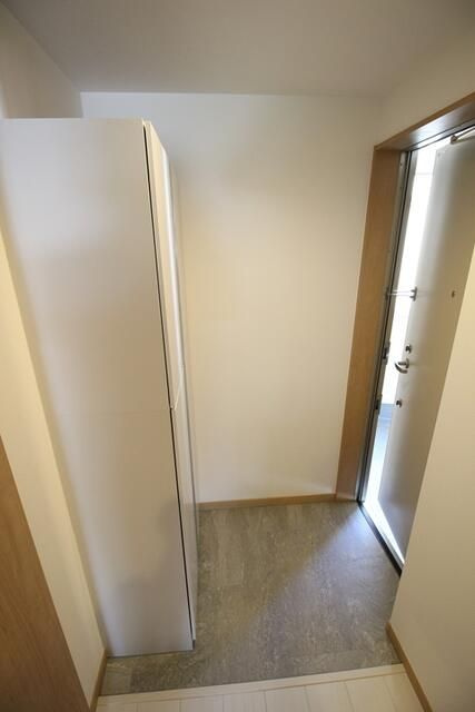 足立区谷在家２丁目のアパートの玄関