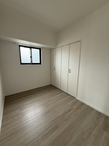 アクロス箱崎駅前クレスティアの洋室