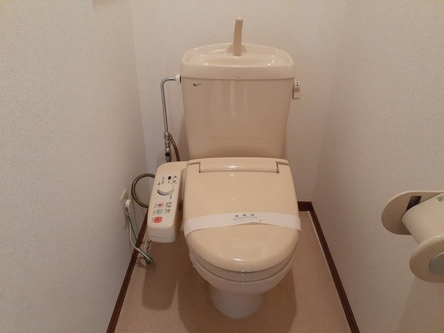 Ｔ．レックスのトイレ|落ち着いた色調のトイレです