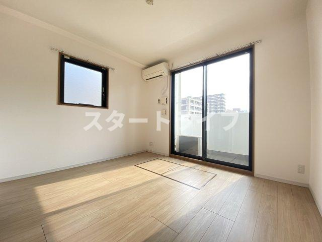 大阪市淀川区木川東３丁目の賃貸マンションの居間・リビング