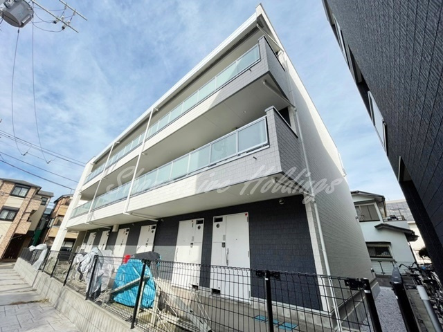 大和市上草柳１丁目の賃貸マンションの外観