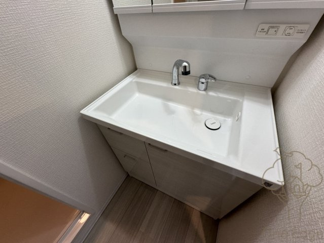 ファーストフィオーレ塚本ウェルビングの洗面所