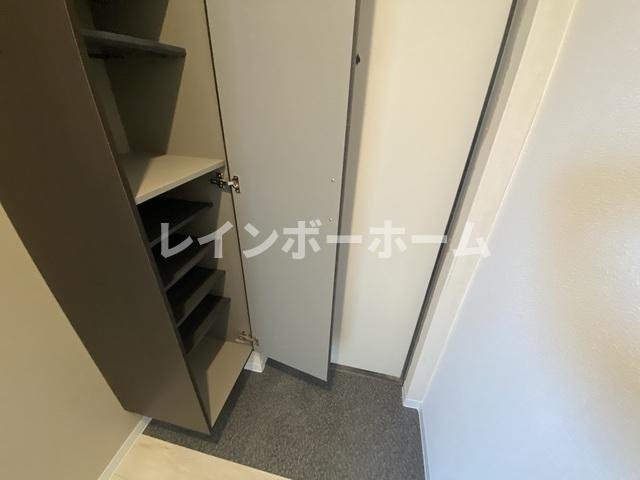 ジーメゾン豊春の玄関