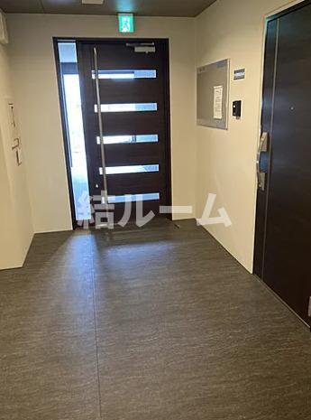 北区西ケ原３丁目の賃貸マンションのエントランス