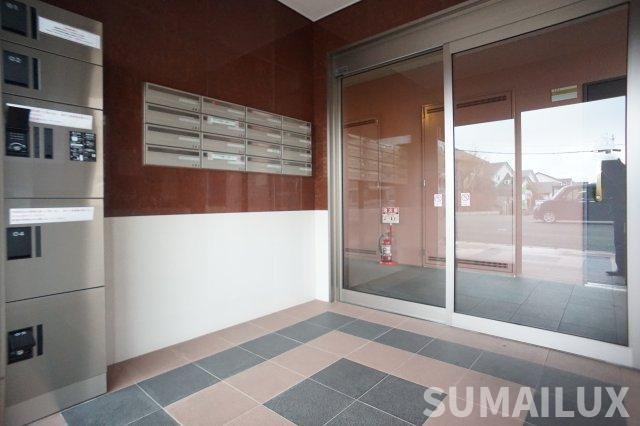 菊池郡大津町美咲野１丁目の賃貸マンションのエントランス