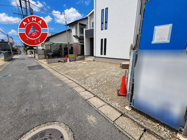福岡市城南区樋井川4丁目第13-1棟（1号棟）の外観|広々した駐車場です。