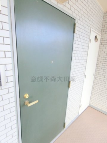 グローリア初穂東糀谷の玄関