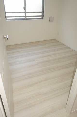 レアライズ西日暮里ノースの寝室