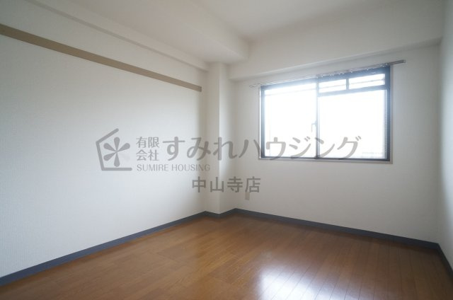 プリメゾン栄美寿の寝室