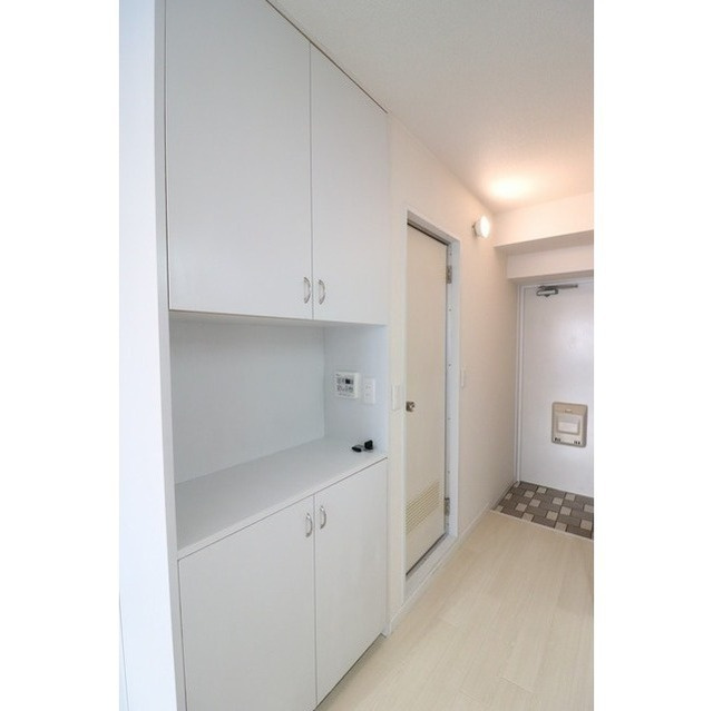 川崎市多摩区東三田３丁目の賃貸マンションの玄関