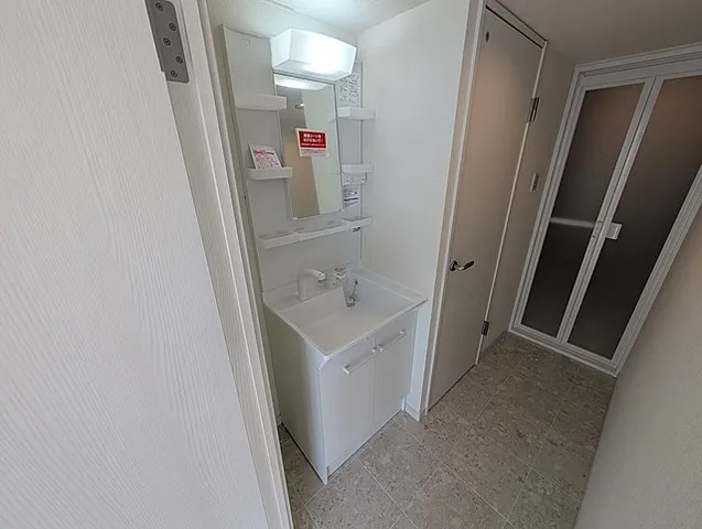神戸市中央区北野町４丁目の賃貸マンションの洗面所