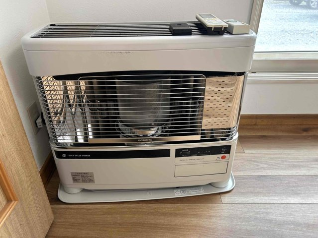 北見市東三輪５丁目５番１０６　中古売家のキッチン|リビングストーブ