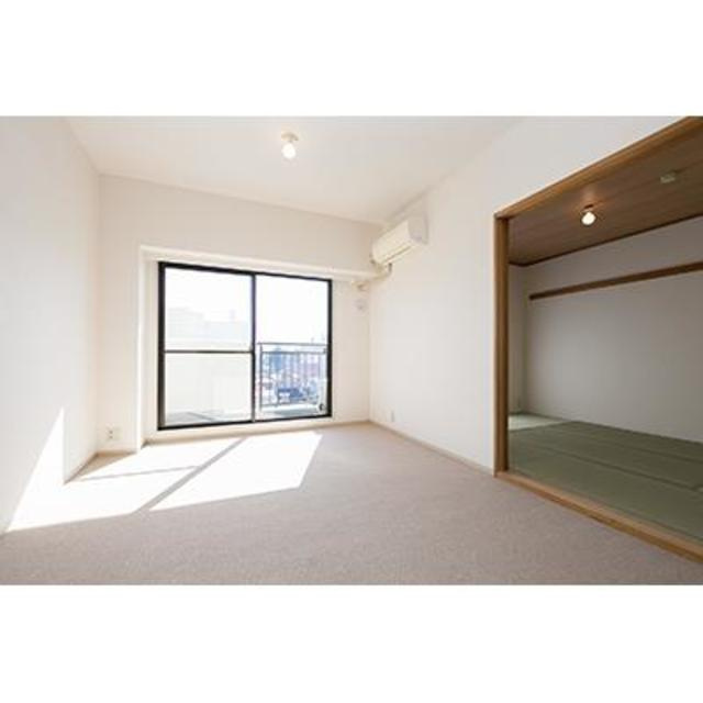 川口本町パーク・ホームズの居間・リビング|※写真は同タイプ住戸です。