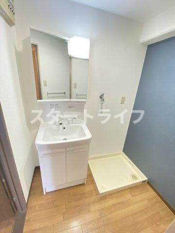 大阪市淀川区十三東４丁目の賃貸マンションの洗面所