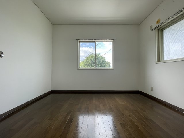 川崎市多摩区菅稲田堤２丁目のアパートの寝室