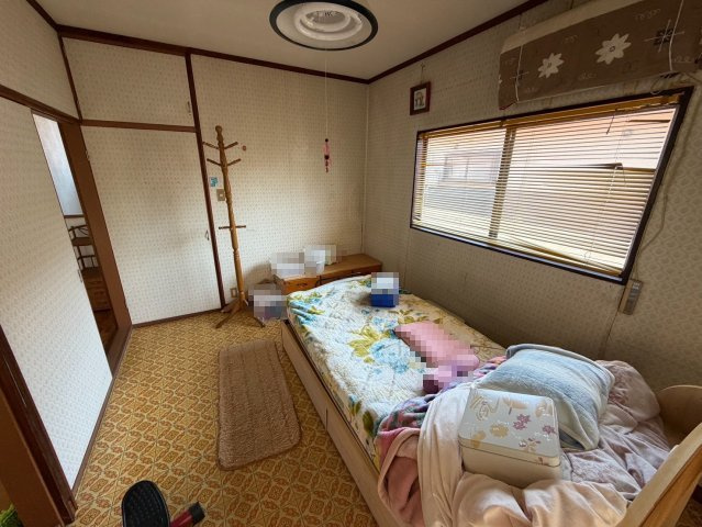 田川市千代町 カーポート　4LDKの寝室