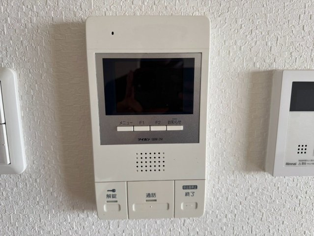 グランプレミア塩上の玄関