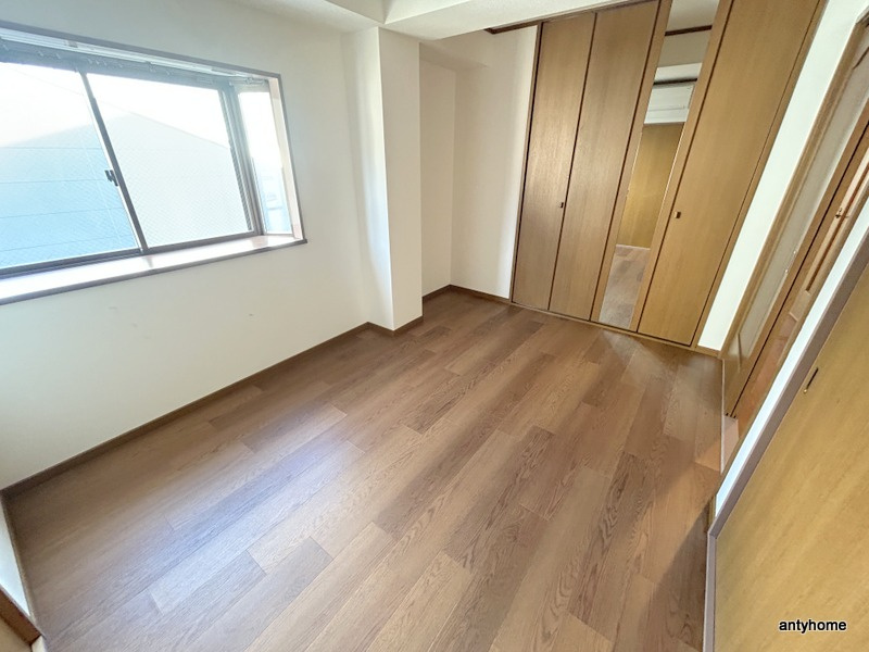 トミーズマンション　仲介手数料無料の寝室