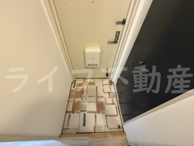 リバーシティ久の玄関