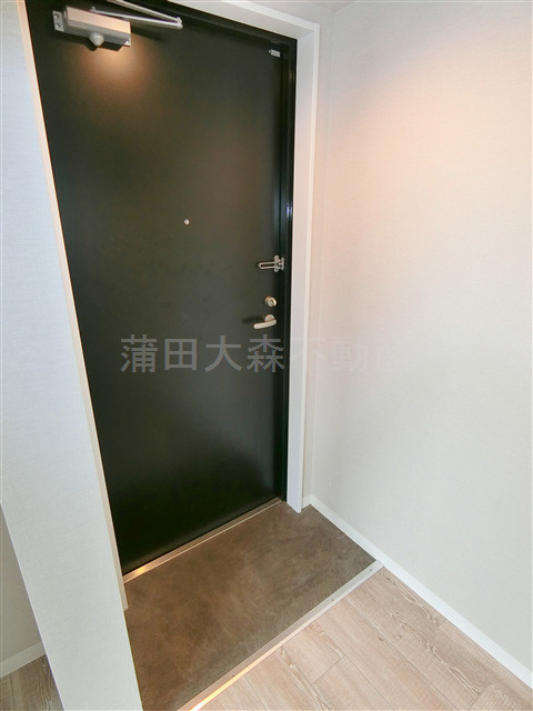 ロータス糀谷の玄関