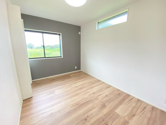 タマタウン大津町杉水／１号棟の洋室