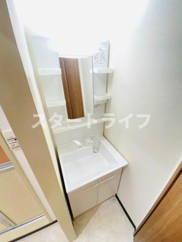 大阪市東淀川区西淡路３丁目の賃貸マンションの洗面所