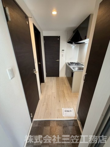 寝屋川市萱島東１丁目のアパートの玄関