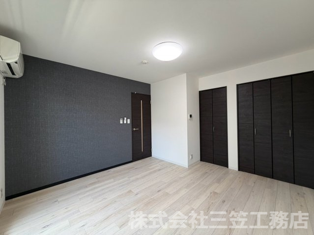 寝屋川市萱島東１丁目のアパートの寝室
