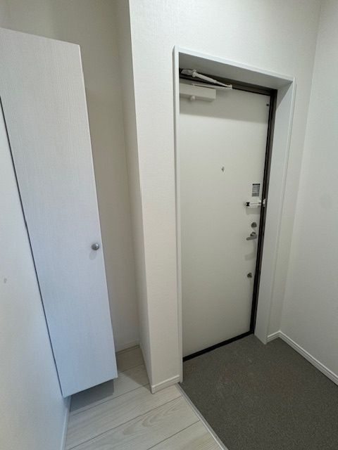 コンフォーティア八潮の玄関