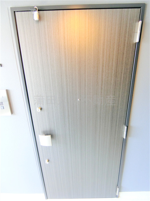 ドゥーエ梅屋敷の玄関