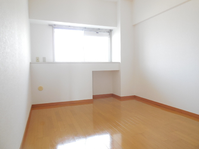 西新南ハイツ　３０２号の寝室