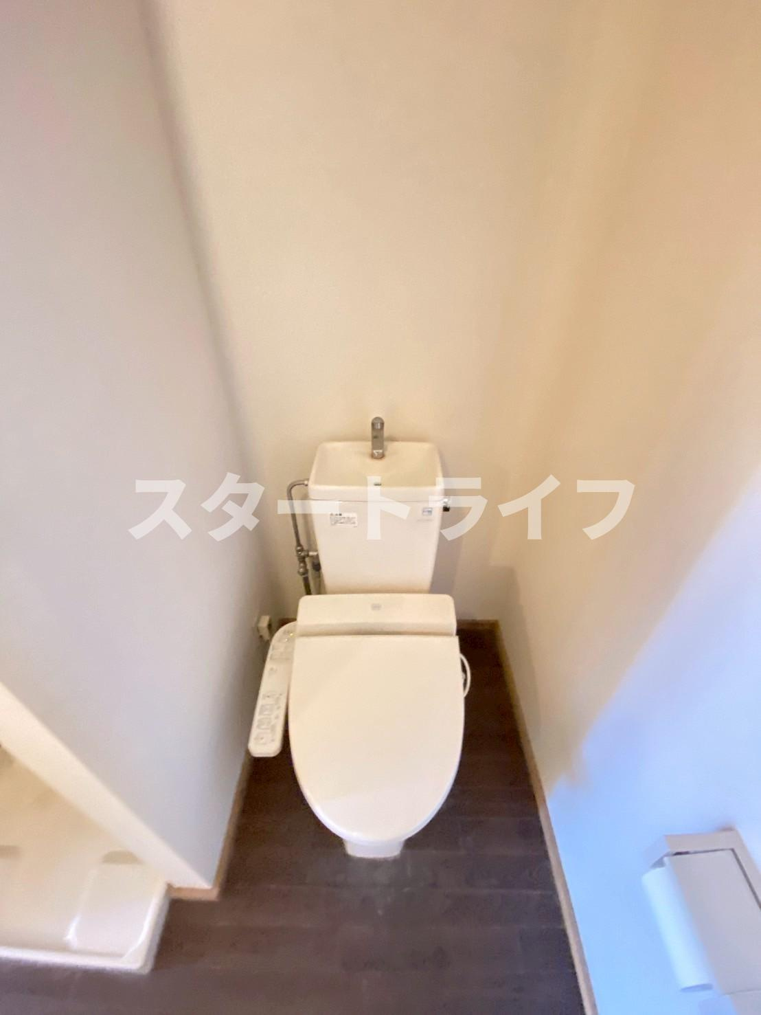 大阪市淀川区十三東３丁目の賃貸マンションのトイレ