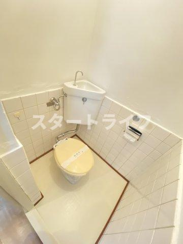 大阪市東淀川区西淡路２丁目の賃貸マンションのトイレ