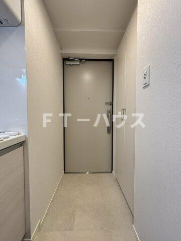 ケイディーエックスレジデンス原木中山の玄関
