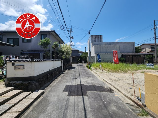 福岡市早良区飯倉4丁目第1-2棟（1号棟）の外観|前面道路含む現地の写真です。