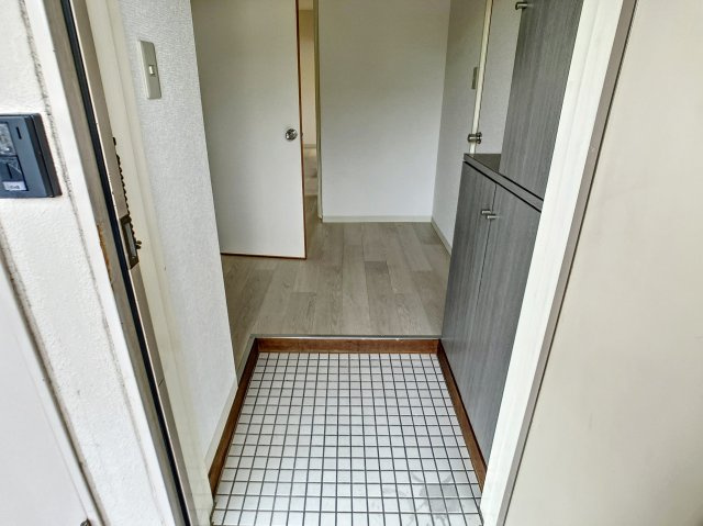 直方市大字頓野の賃貸マンションの玄関