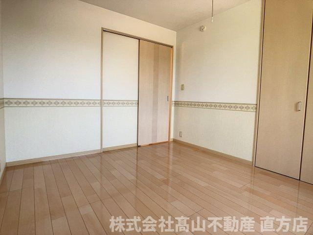 直方市大字頓野のアパートの寝室