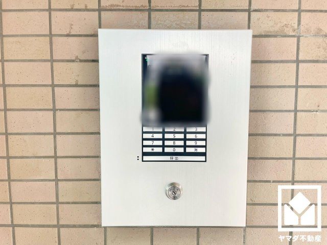 京阪東ローズタウン・ファインガーデンあゆみヶ丘Ｅ棟の防犯設備