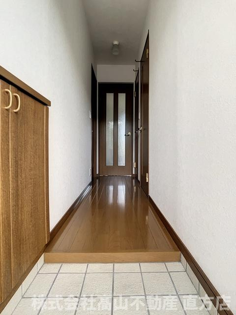 直方市大字頓野のアパートの玄関