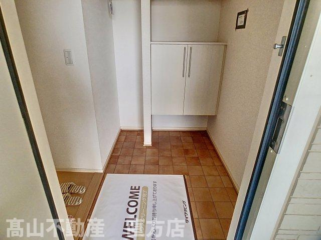 直方市大字頓野のアパートの玄関