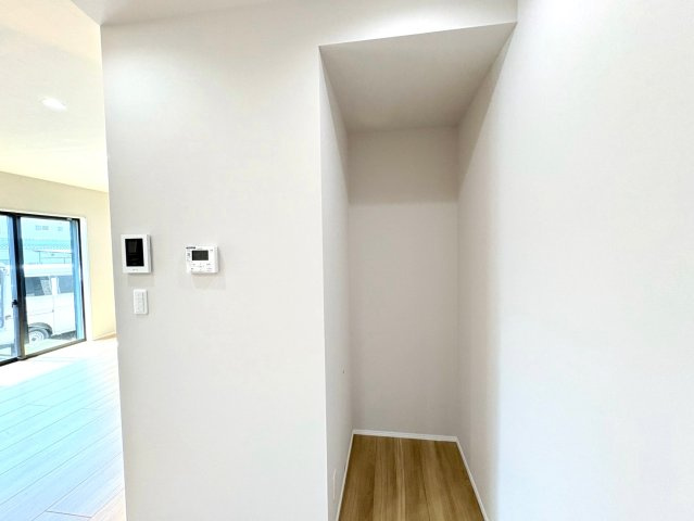 タマタウン　関市巾1丁目（倉知小Ⅲ）　全5区画分譲のキッチン|レンジフード（換気扇）は昔の換気扇と違い掃除がしやすいタイプです。