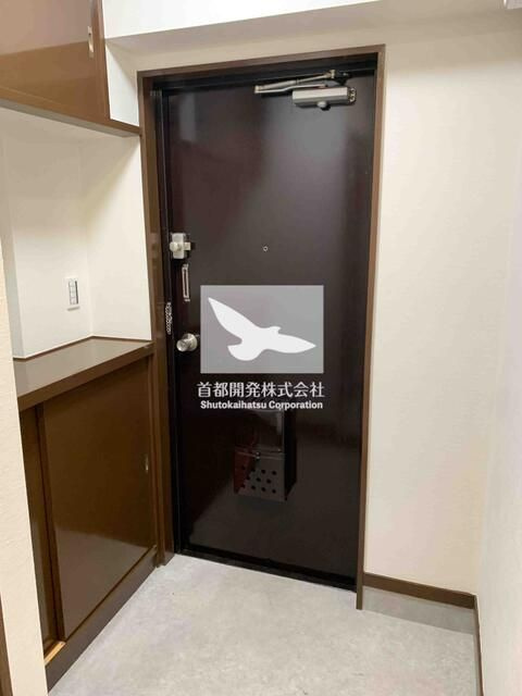 総建メゾン三幸の玄関