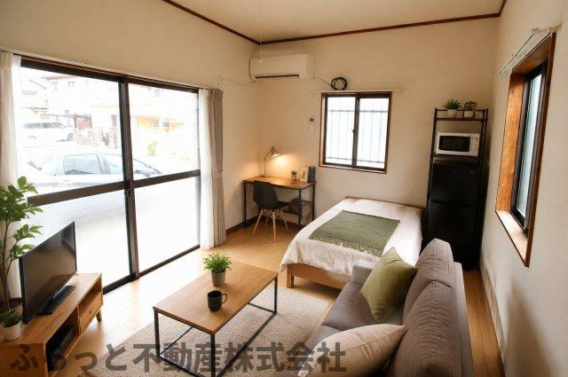 須藤川原代町住宅の居間・リビング|家具・家電はAIによるイメージになります