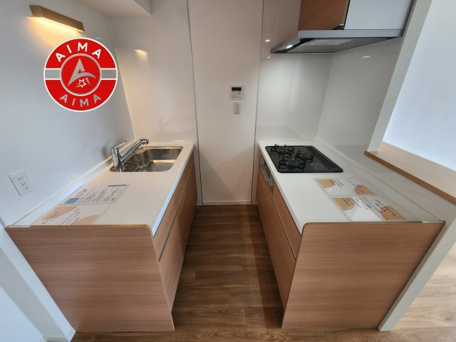 東峰マンション野間大池公園のキッチン|リビングと一体感のある、明るくのびやかなオープンキッチン。
