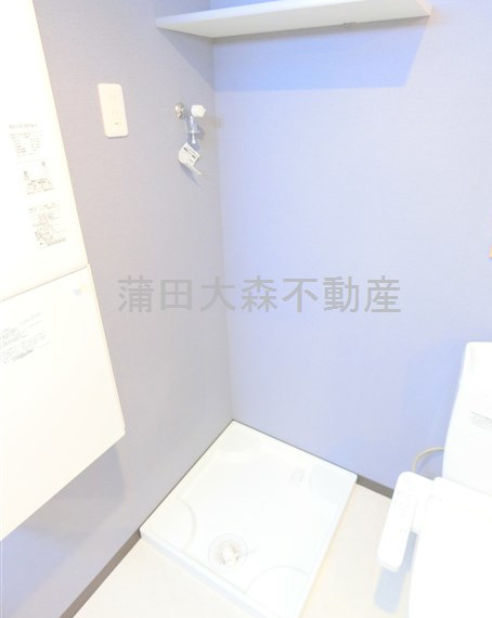 スマートVILLA羽田の設備|棚と室内洗濯機置き場