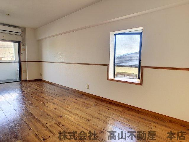 宗像市東郷１丁目の賃貸マンションの居間・リビング